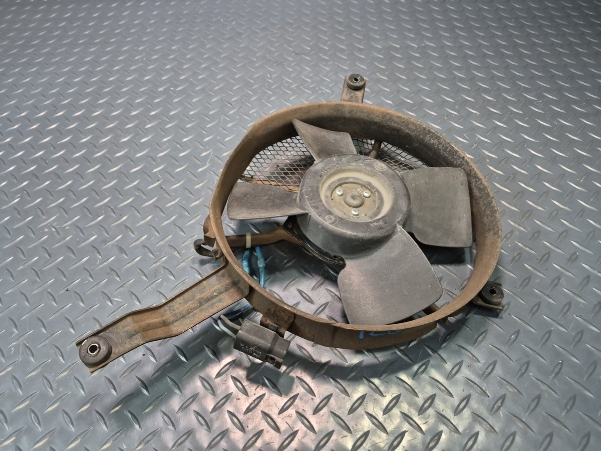 85-86 Toyota Cressida MX73 A/C Condenser Cooling Fan Motor w Shroud & Mount OEM