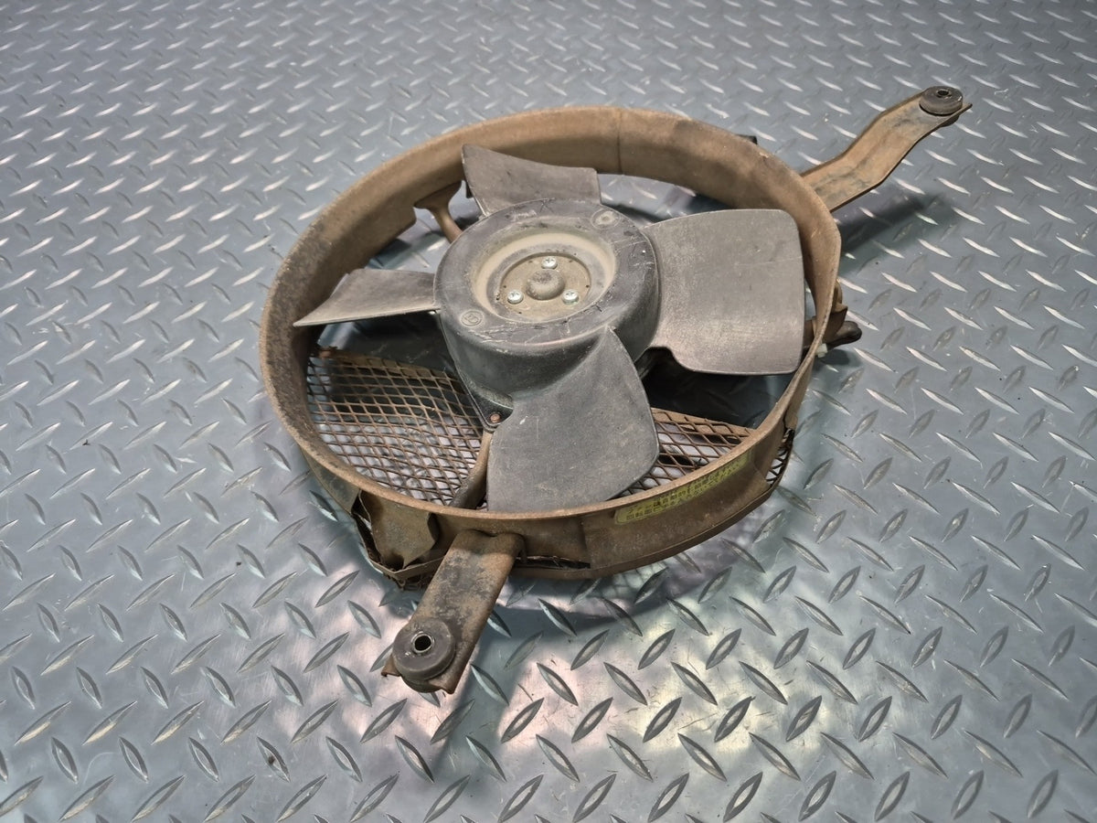 85-86 Toyota Cressida MX73 A/C Condenser Cooling Fan Motor w Shroud & Mount OEM