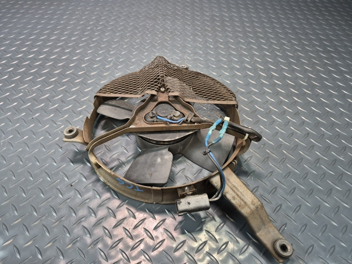 85-86 Toyota Cressida MX73 A/C Condenser Cooling Fan Motor w Shroud & Mount OEM
