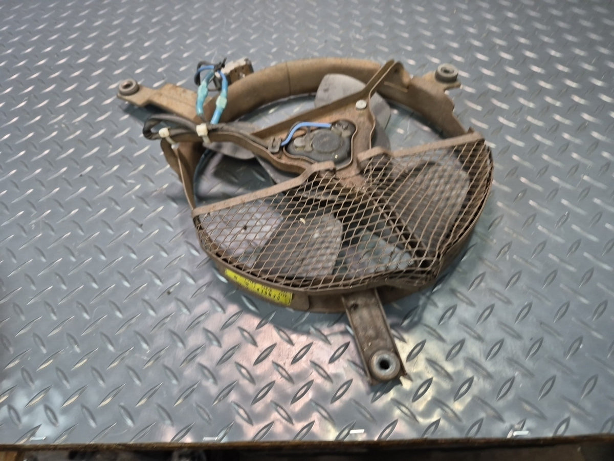 85-86 Toyota Cressida MX73 A/C Condenser Cooling Fan Motor w Shroud & Mount OEM