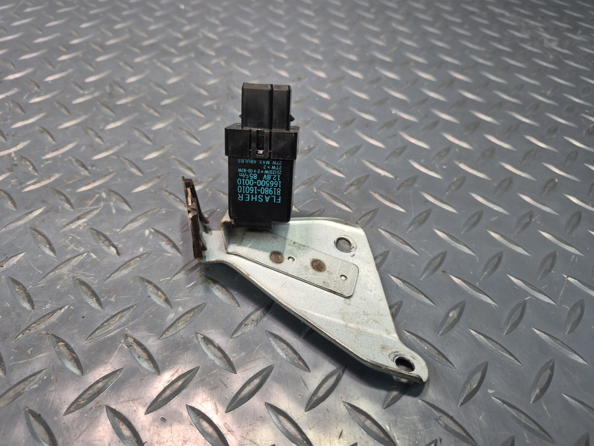 84-86 Toyota Cressida MX73 Turn Signal Flasher Relay w Mount 81980-16010 OEM