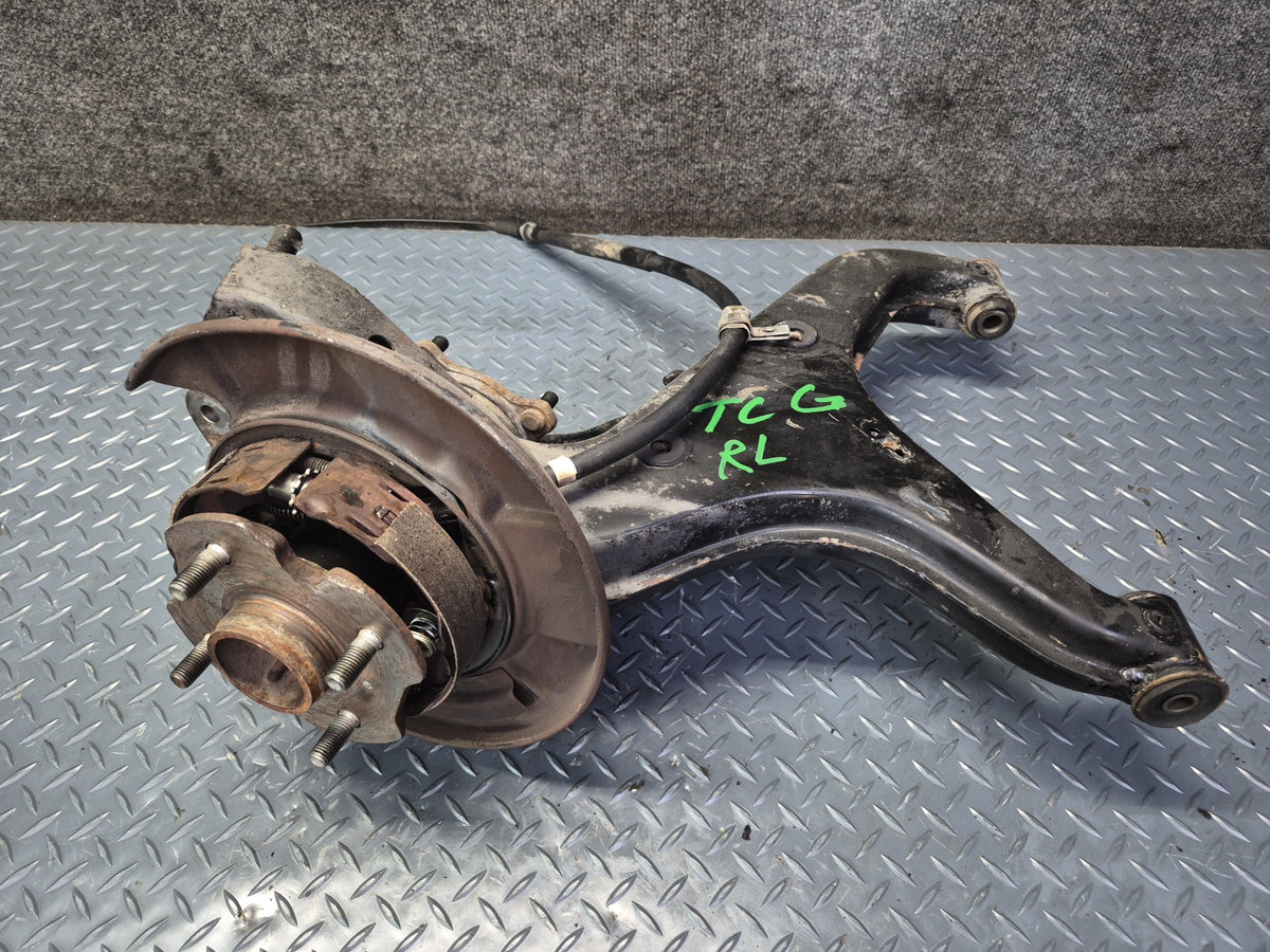 84-88 Toyota Cressida MX73 Rear Left Trailing Arm Wheel Hub Spindle Knuckle OEM