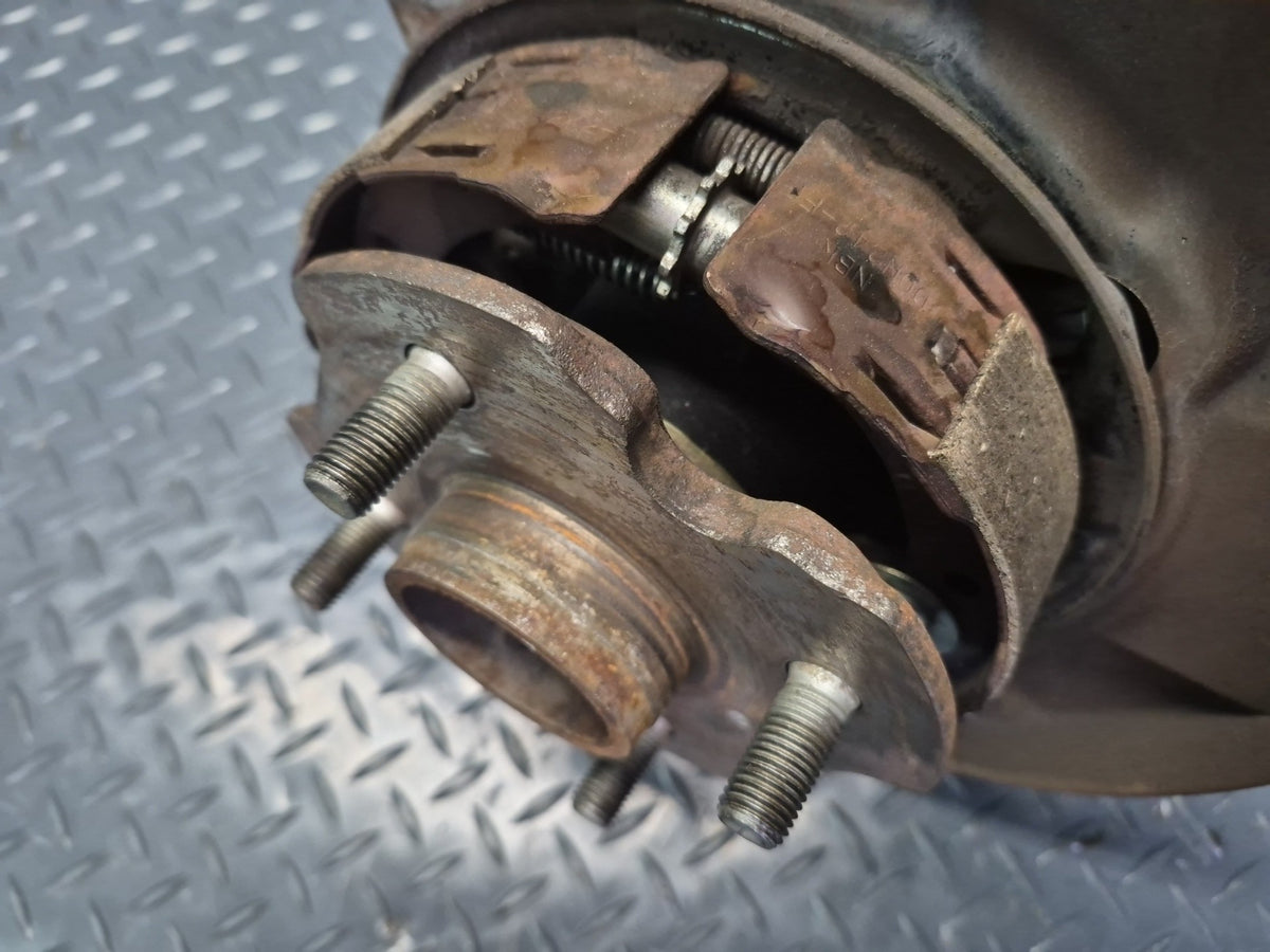 84-88 Toyota Cressida MX73 Rear Left Trailing Arm Wheel Hub Spindle Knuckle OEM