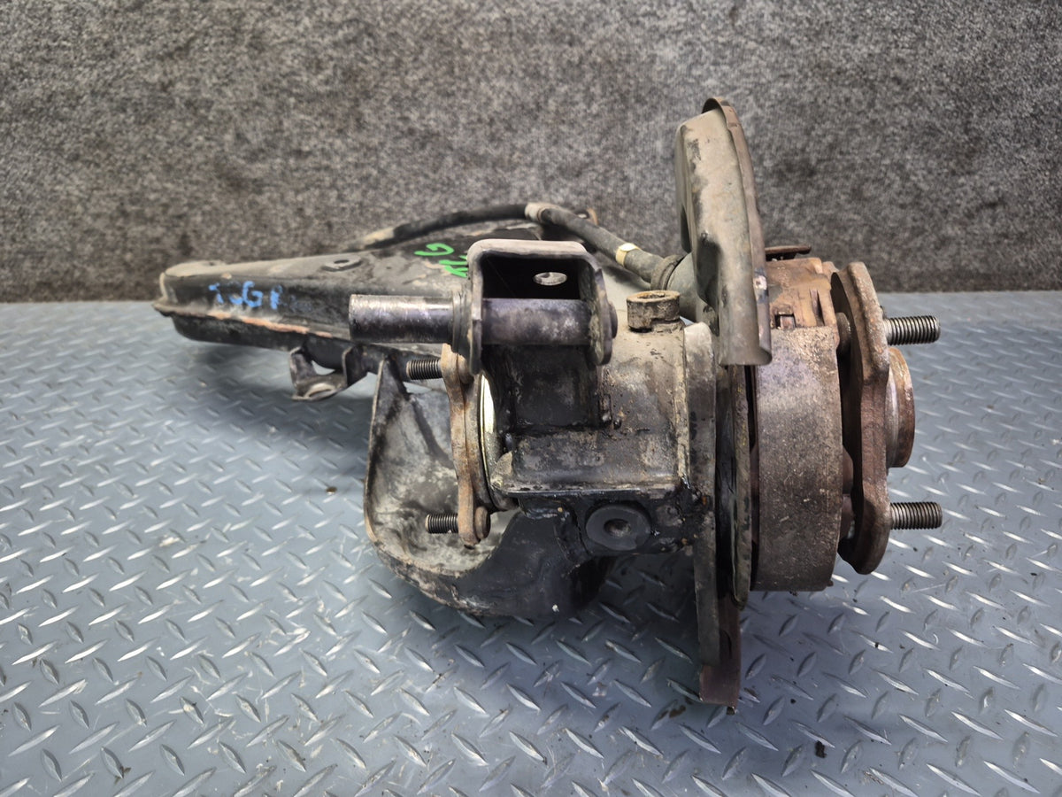 84-88 Toyota Cressida MX73 Rear Left Trailing Arm Wheel Hub Spindle Knuckle OEM