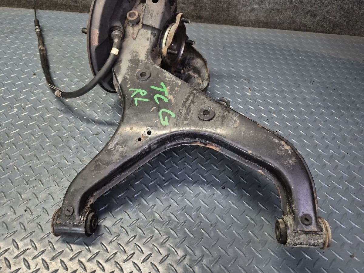 84-88 Toyota Cressida MX73 Rear Left Trailing Arm Wheel Hub Spindle Knuckle OEM