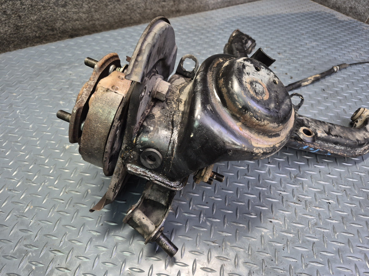 84-88 Toyota Cressida MX73 Rear Left Trailing Arm Wheel Hub Spindle Knuckle OEM