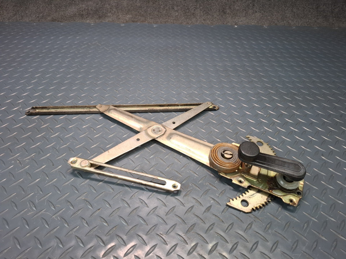 82-85 Toyota Celica RA65 Left Door Manual Window Regulator w Handle OEM