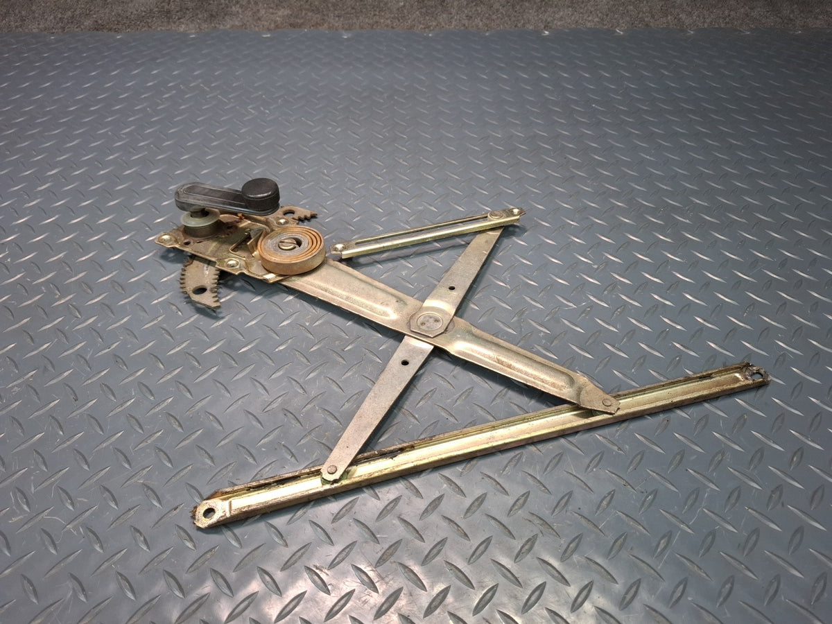 82-85 Toyota Celica RA65 Left Door Manual Window Regulator w Handle OEM