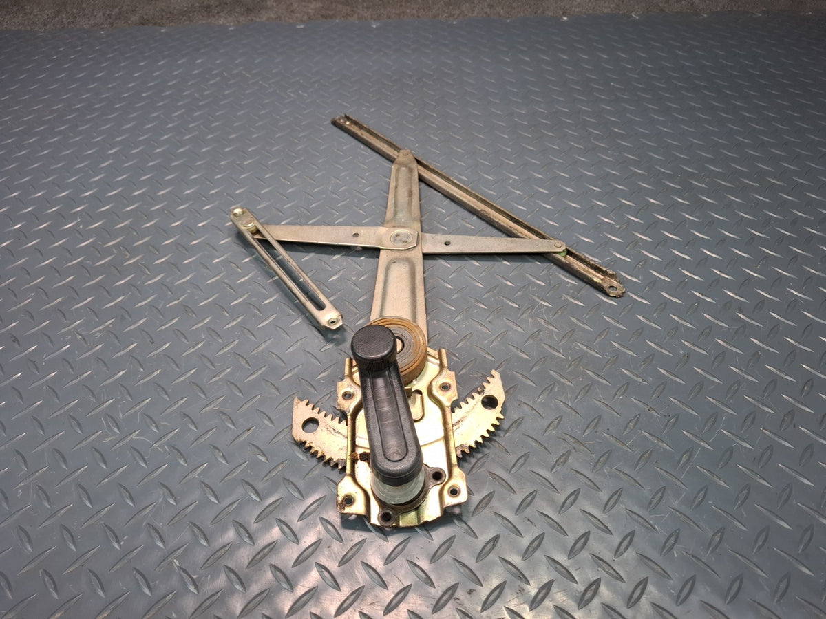 82-85 Toyota Celica RA65 Left Door Manual Window Regulator w Handle OEM