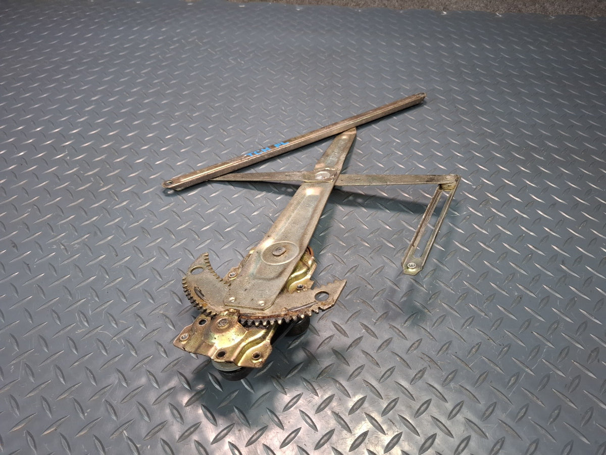82-85 Toyota Celica RA65 Left Door Manual Window Regulator w Handle OEM
