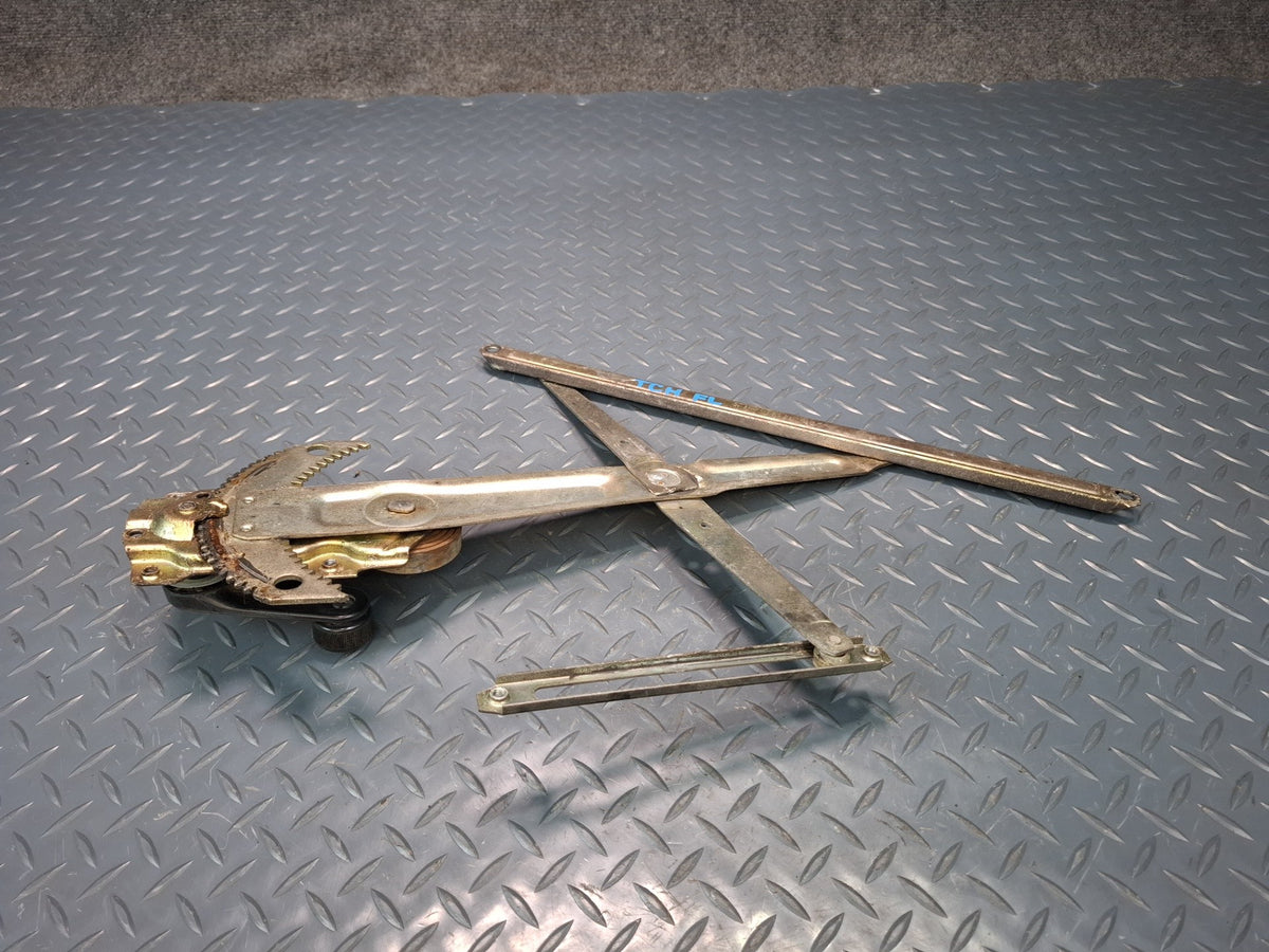 82-85 Toyota Celica RA65 Left Door Manual Window Regulator w Handle OEM