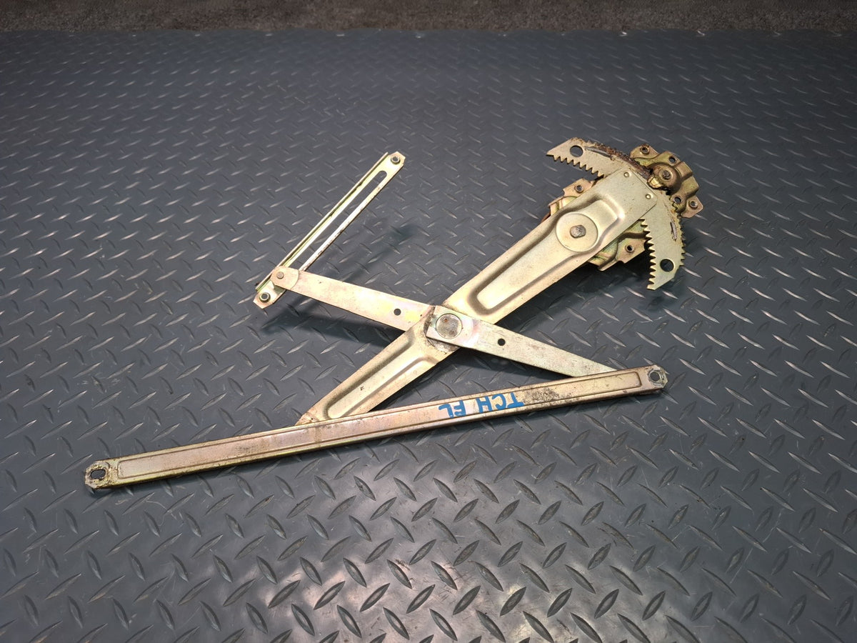 82-85 Toyota Celica RA65 Left Door Manual Window Regulator w Handle OEM