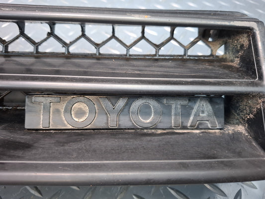 82-83 Toyota Celica RA65 Front Bumper Radiator Grille w Emblem OEM