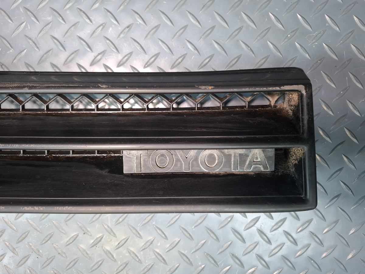 82-83 Toyota Celica RA65 Front Bumper Radiator Grille w Emblem OEM