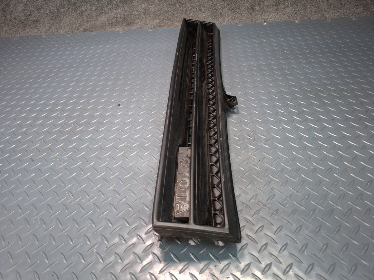 82-83 Toyota Celica RA65 Front Bumper Radiator Grille w Emblem OEM
