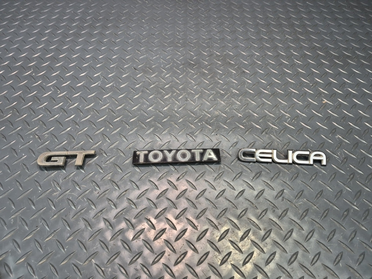 82-83 Toyota Celica GT RA65 Rear Trunk Lid Emblem Logo Badge Symbol Set Damaged