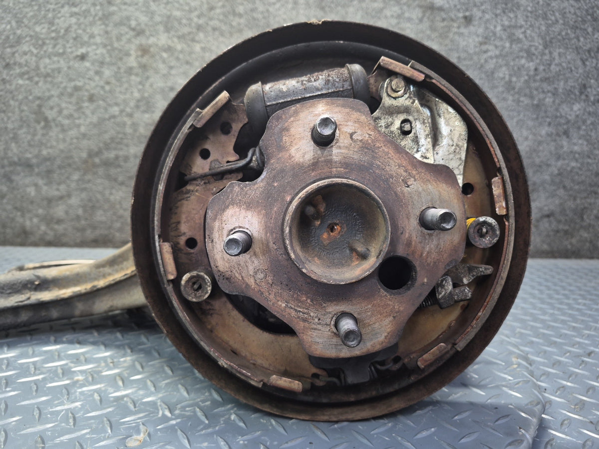 83-85 Toyota Celica Gt-s RA65 Convertible Rear Left Knuckle Wheel Hub OEM