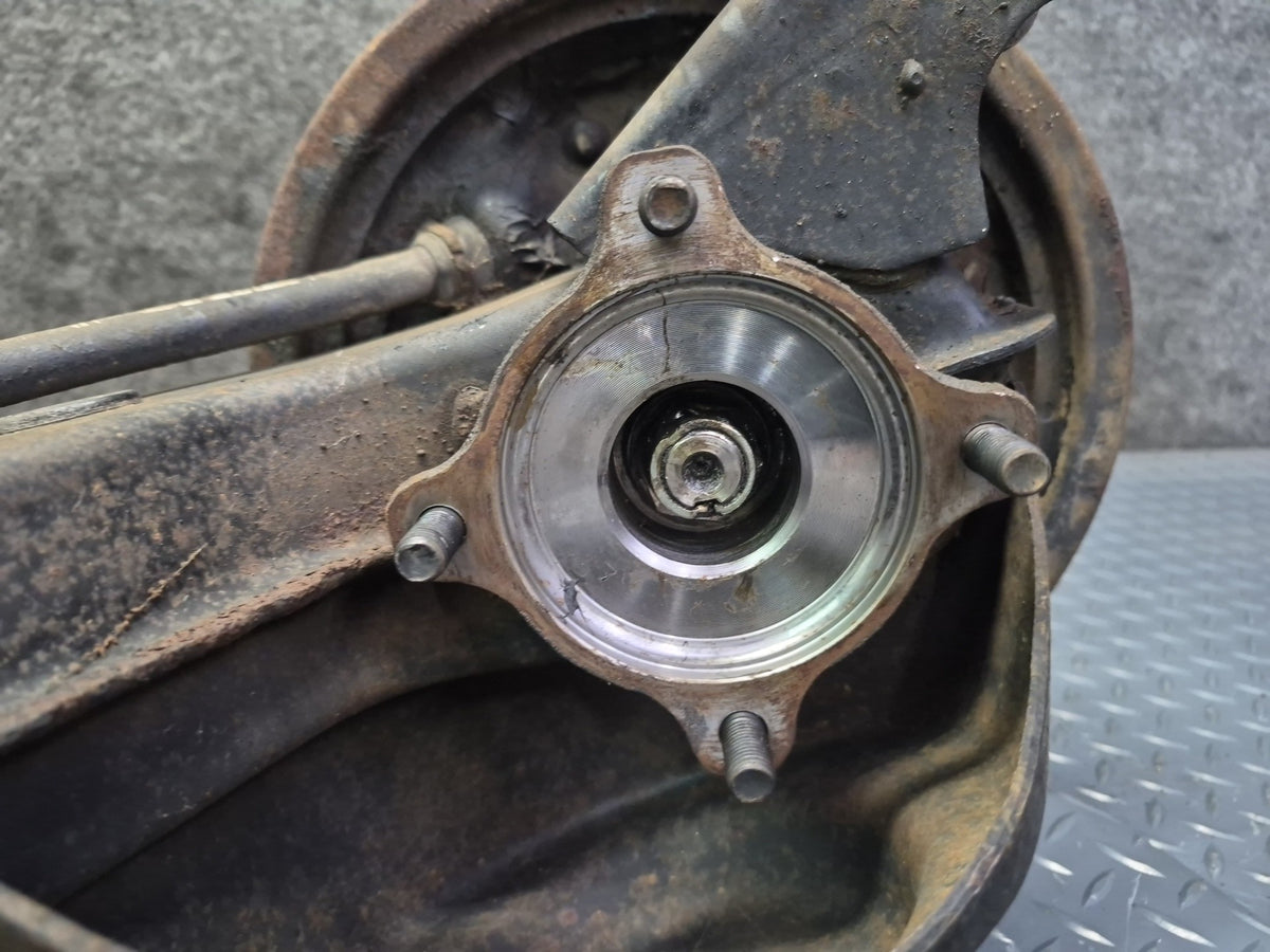 83-85 Toyota Celica Gt-s RA65 Convertible Rear Left Knuckle Wheel Hub OEM