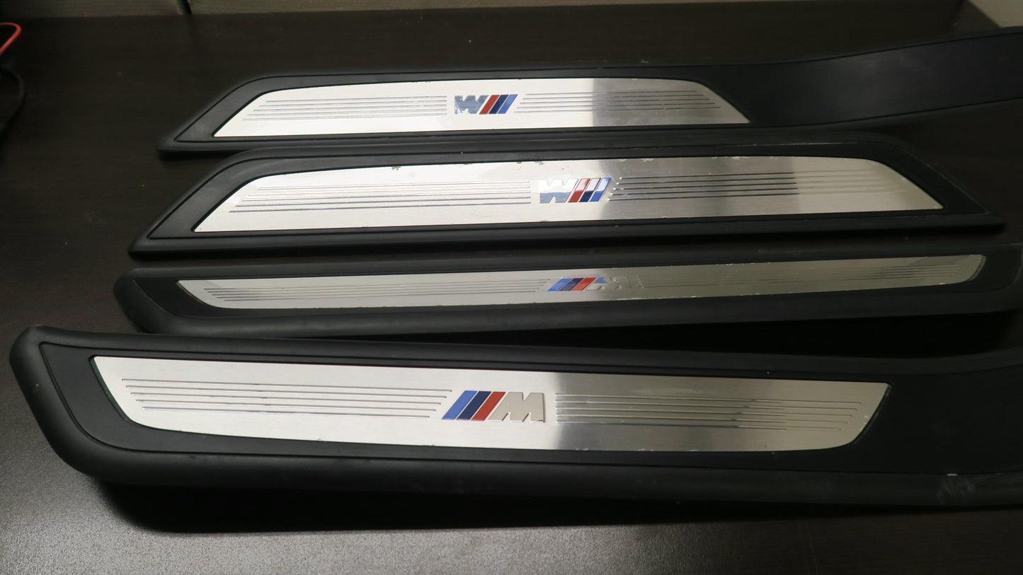 2009-2015 BMW 750Li F02 7-Series Long M Package Door Sill Entrance Cover Set OEM
