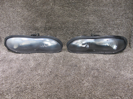 98-02 CHEVROLET CAMARO SET OF 2 FRONT RIGHT & LEFT HEADLIGHT LAMP FEBERG