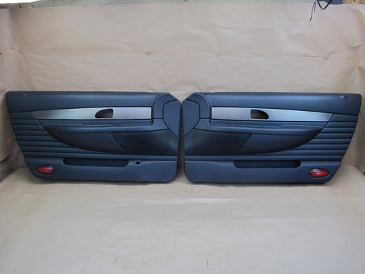 02-05 FORD THUNDERBIRD SET OF 2 LEFT & RIGHT DOOR TRIM COVER PANEL OEM