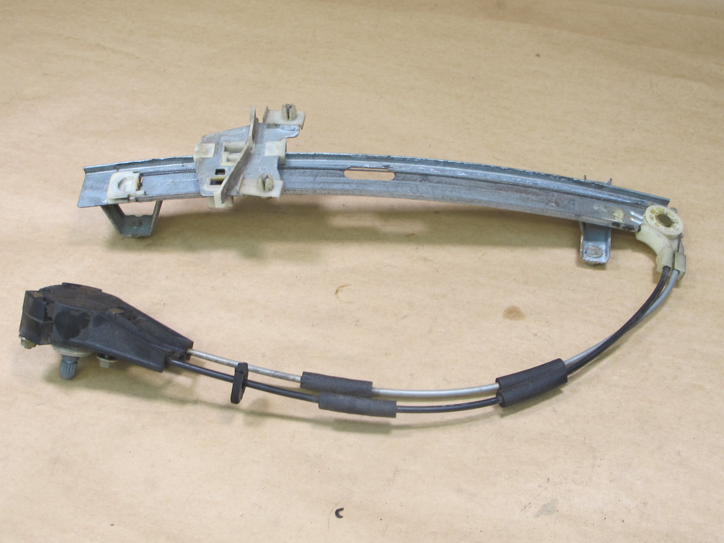 86-91 MAZDA RX7 COUPE RIGHT DOOR MANUAL WINDOW REGULATOR OEM