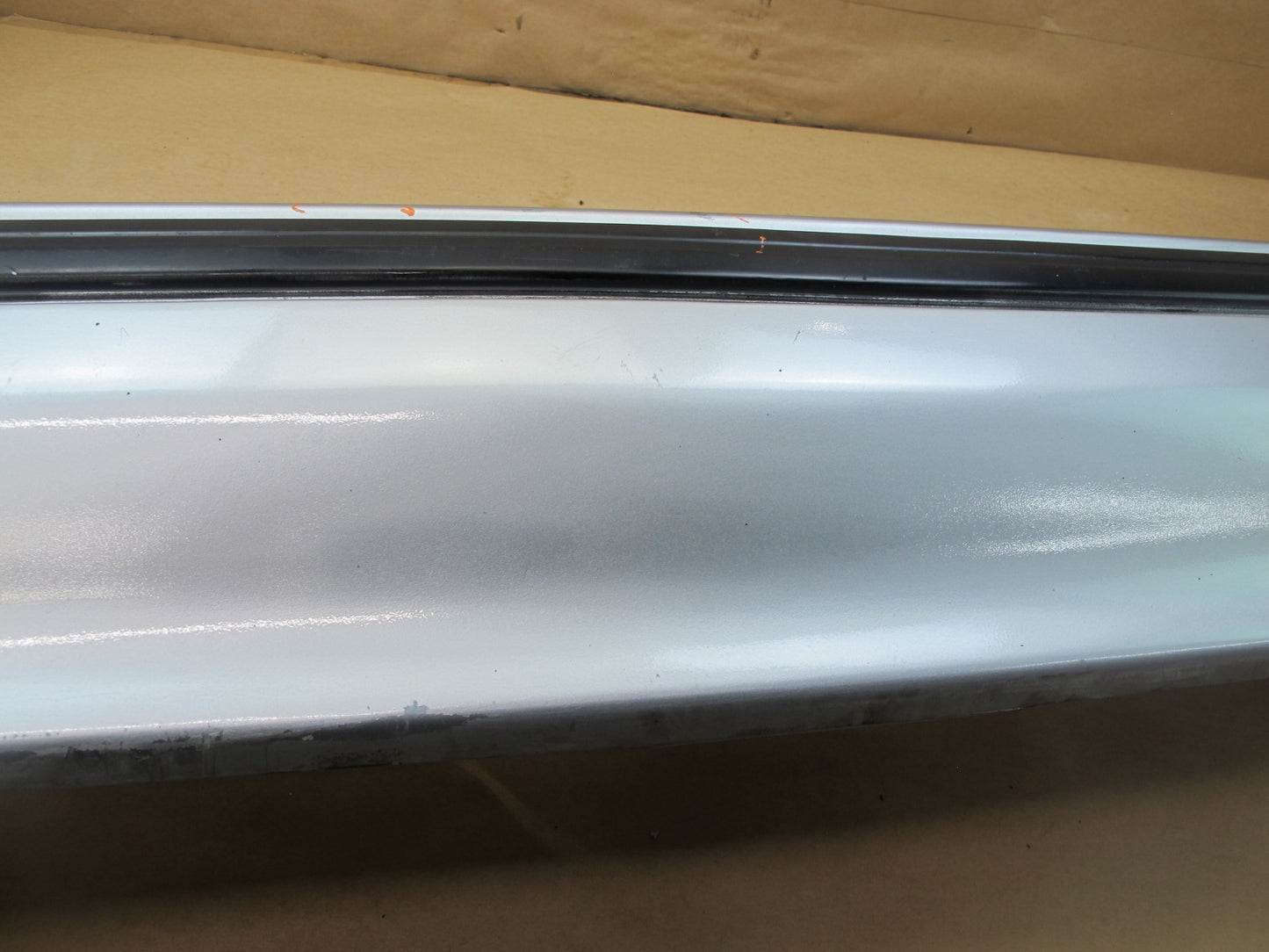 86-88 MAZDA RX7 COUPE REAR BUMPER COVER DUAL EXHAUST CUTOUT ARCTIC SILVER OEM