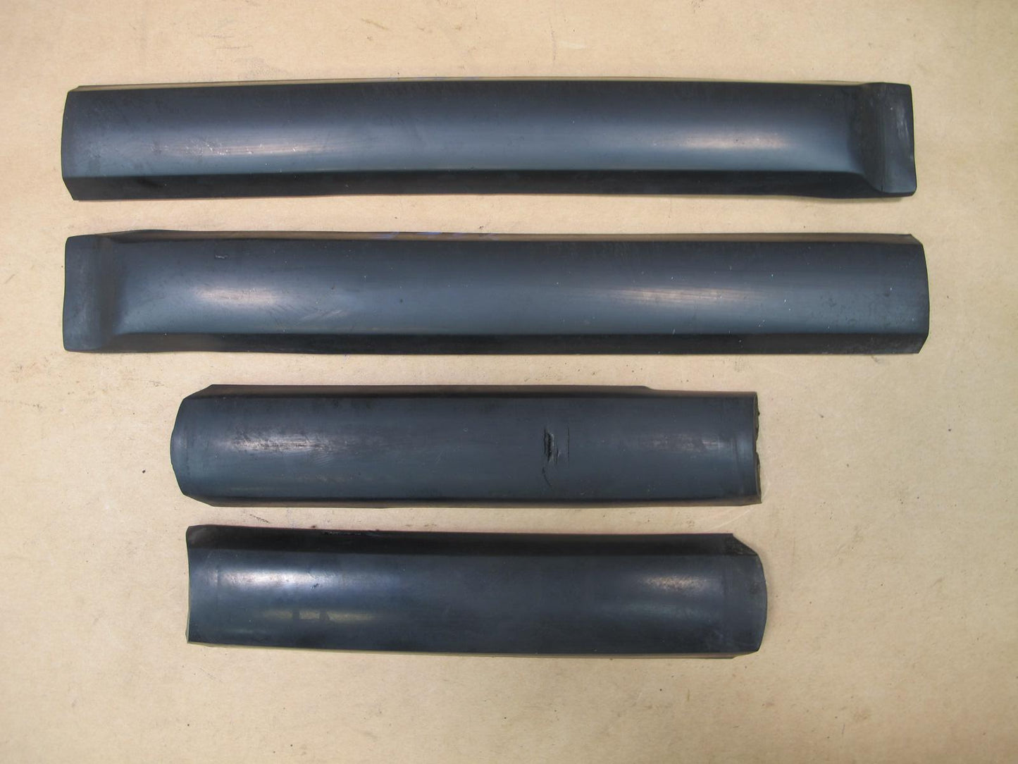 81-85 MERCEDES R107 SET OF 4 FRONT BUMPER RUBBER GUARD OEM