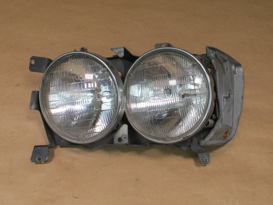 73-85 MERCEDES R107 FRONT LEFT HALOGEN HEADLIGHT LAMP 1305523033 OEM