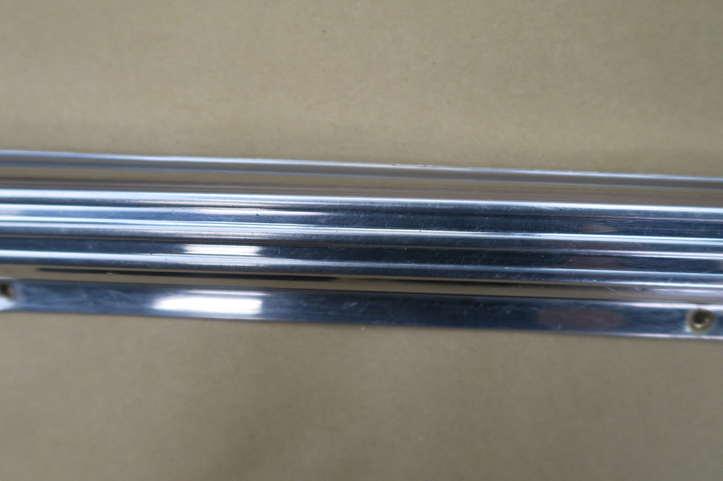 73-85 MERCEDES R107 REAR LEFT CHROME MOLDING COVER OEM