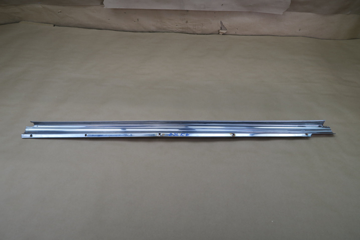 73-85 MERCEDES R107 REAR LEFT CHROME MOLDING COVER OEM