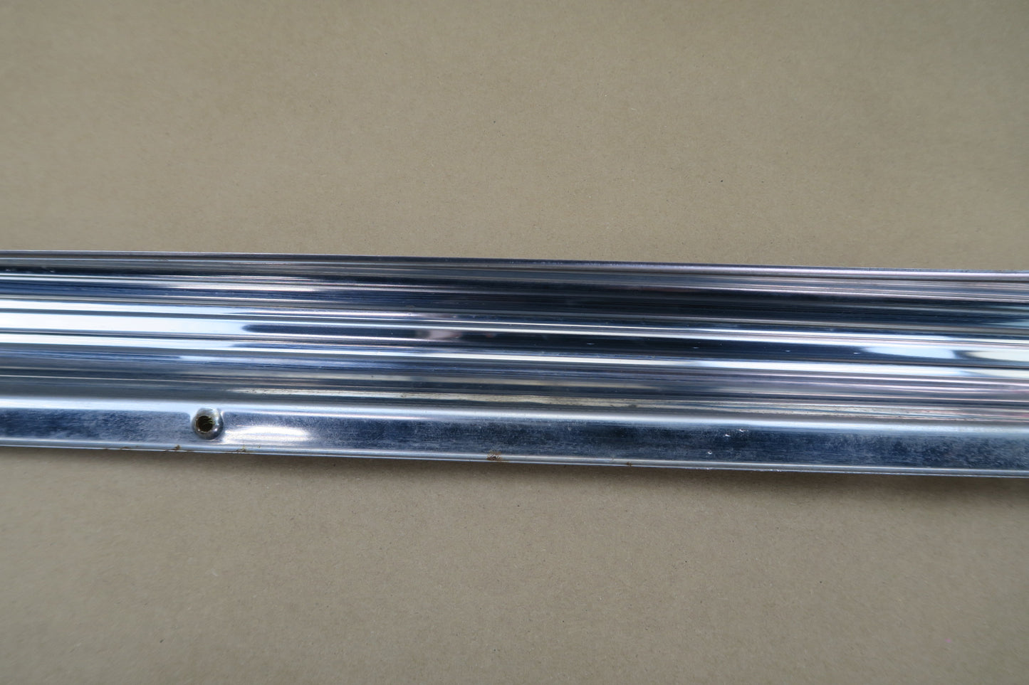 73-85 MERCEDES R107 REAR LEFT CHROME MOLDING COVER OEM